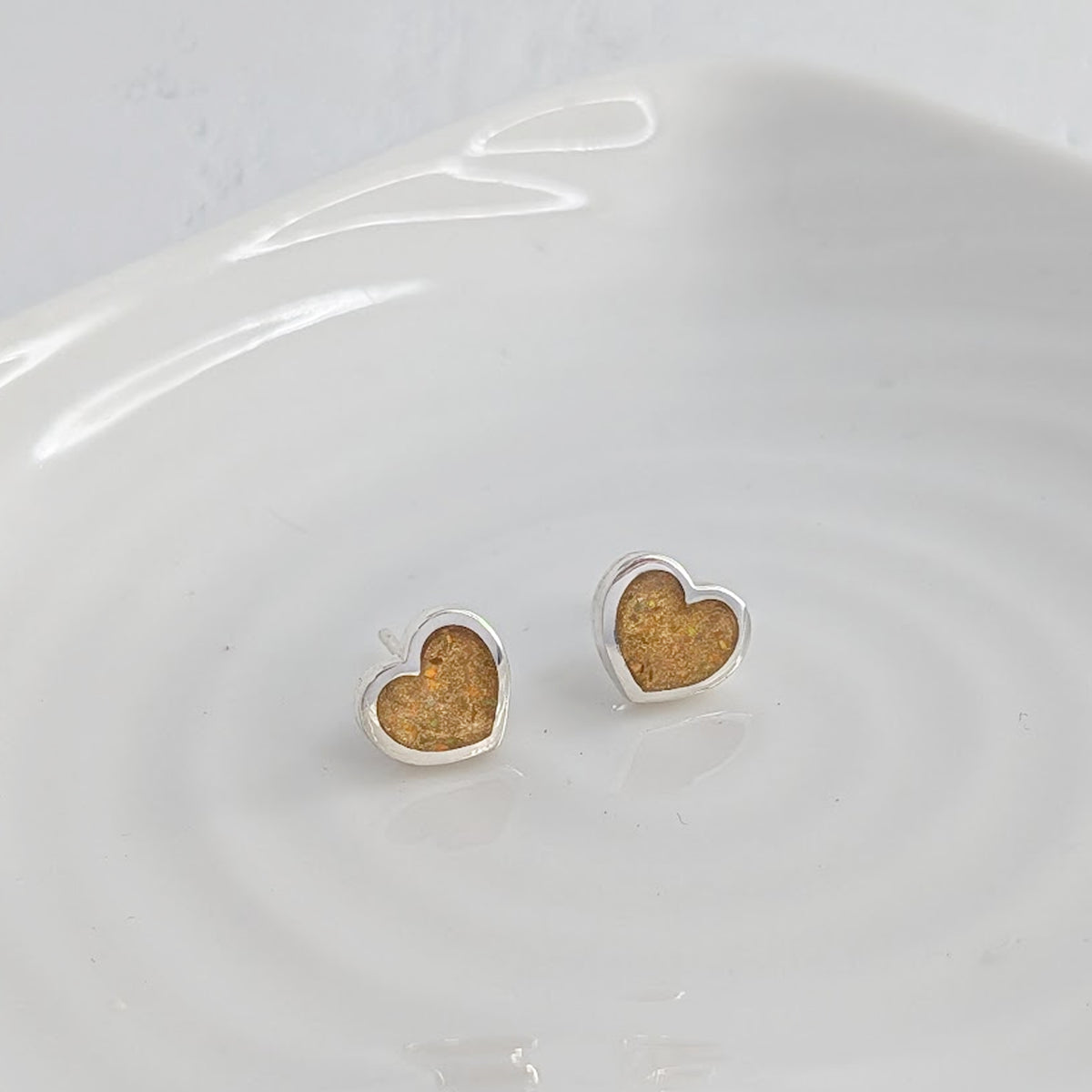 handmade silver heart stud earrings with hidden memorial ashes