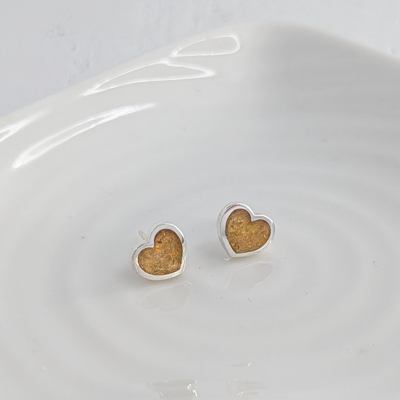 handmade silver heart stud earrings with hidden memorial ashes