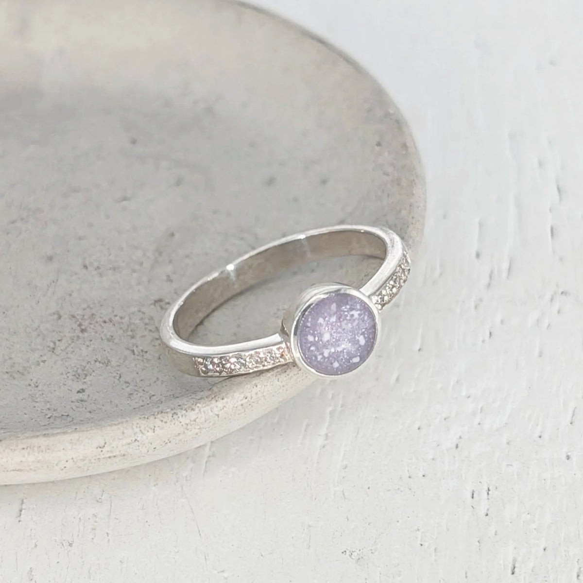 Round memorial ashes ring in sterling silver with sparkling cubic zirconia shoulders