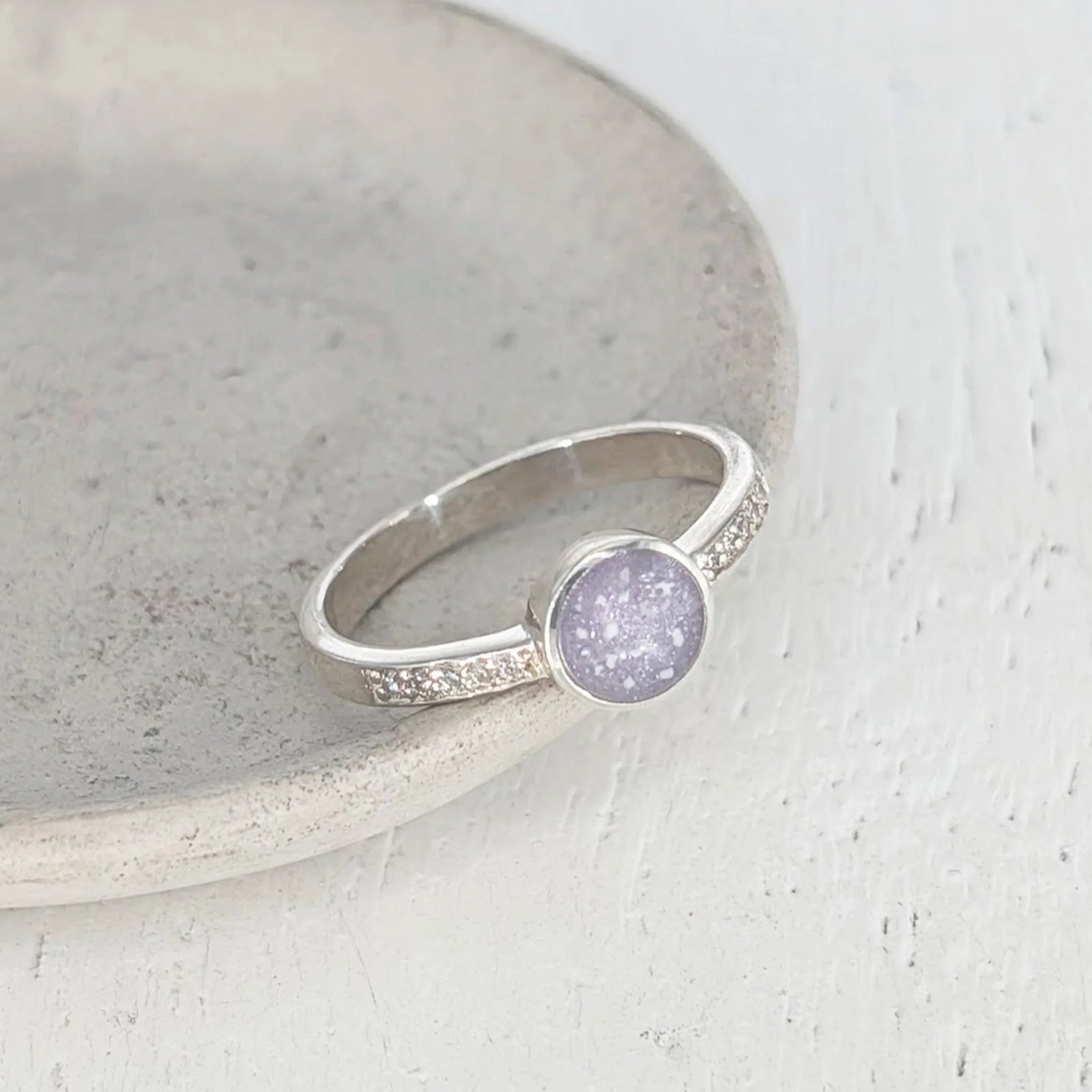 Sterling silver cremation ashes ring with round memorial setting and cubic zirconia detail