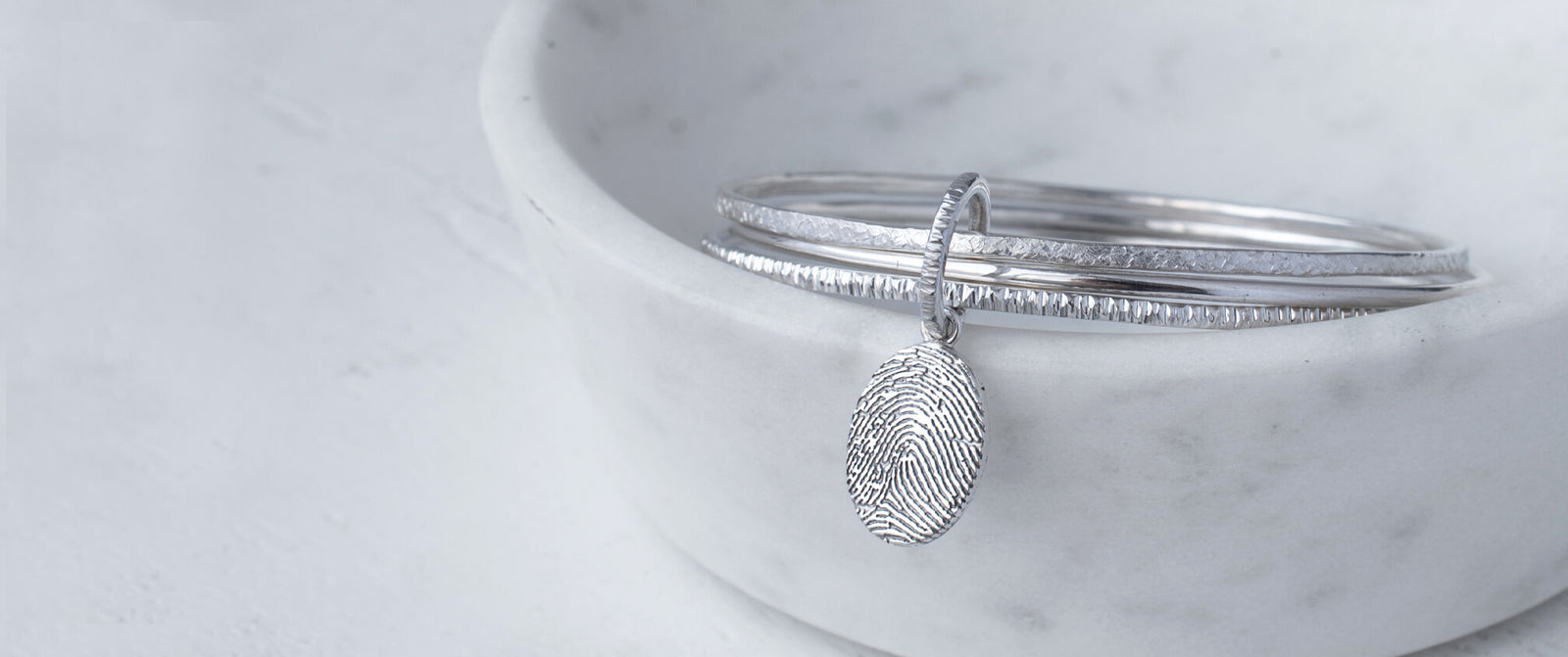 Memorial Fingerprint Jewellery and Baby Fingerprint Charms in Silver and Solid Gold | Fingerprint Charms | Fingerprint Necklaces | Fingerprint Rings | Fingerprint Cufflinks | Fingerprint Bracelets | Fingerprint Keyrings