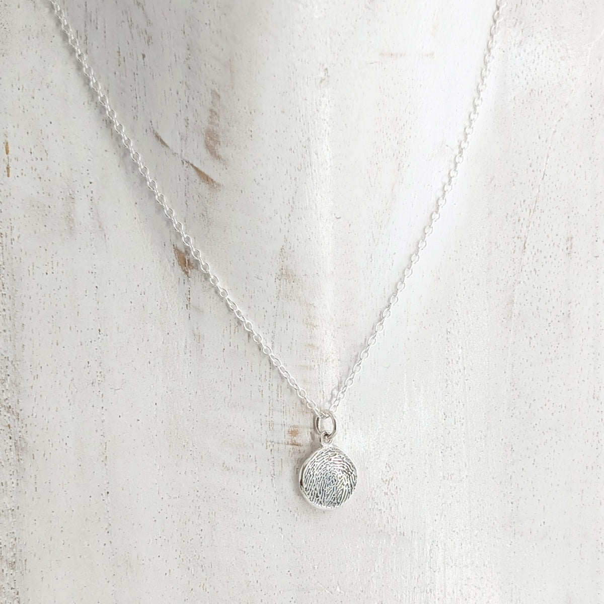 MOLTEN FINGERPRINT CHARM