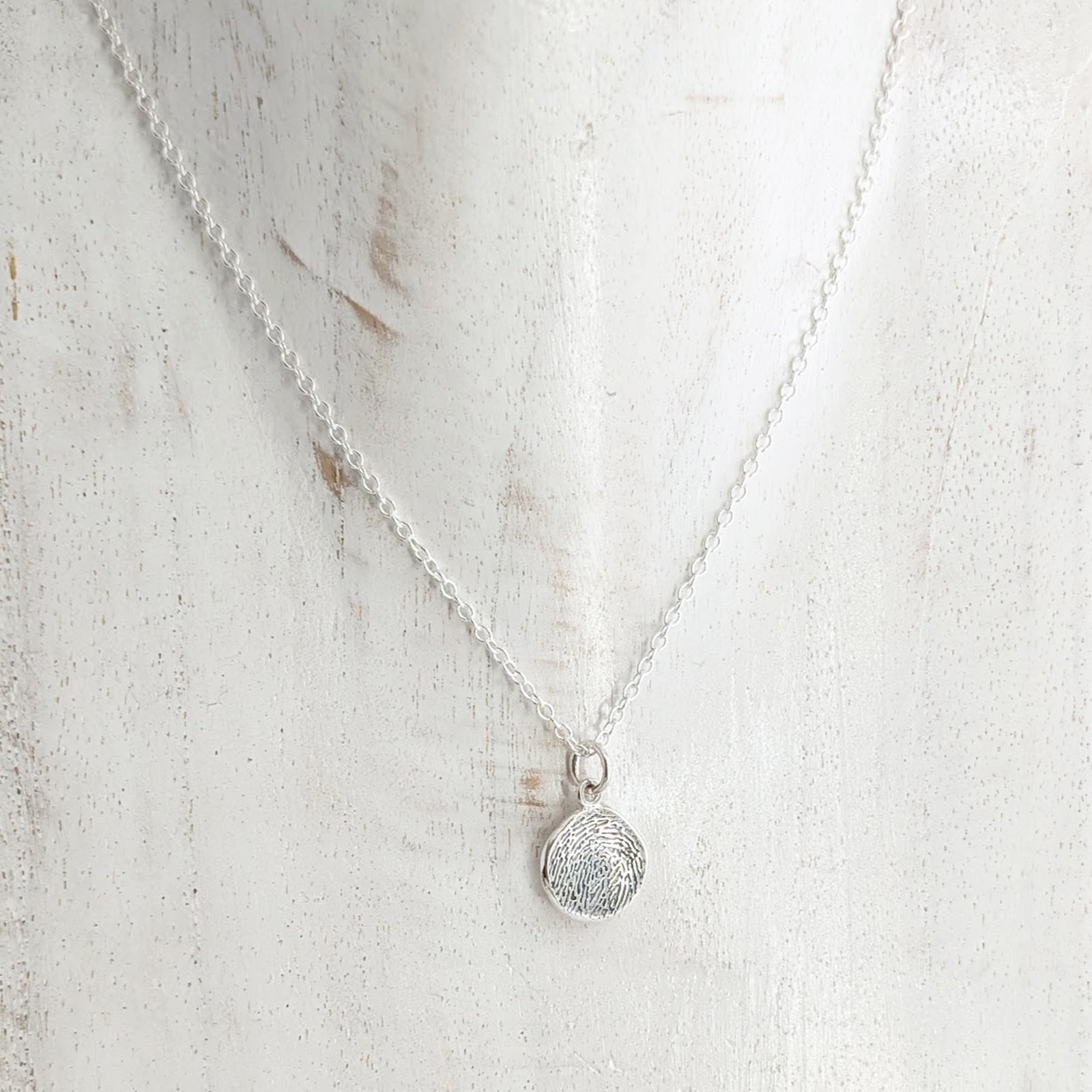 MOLTEN FINGERPRINT CHARM