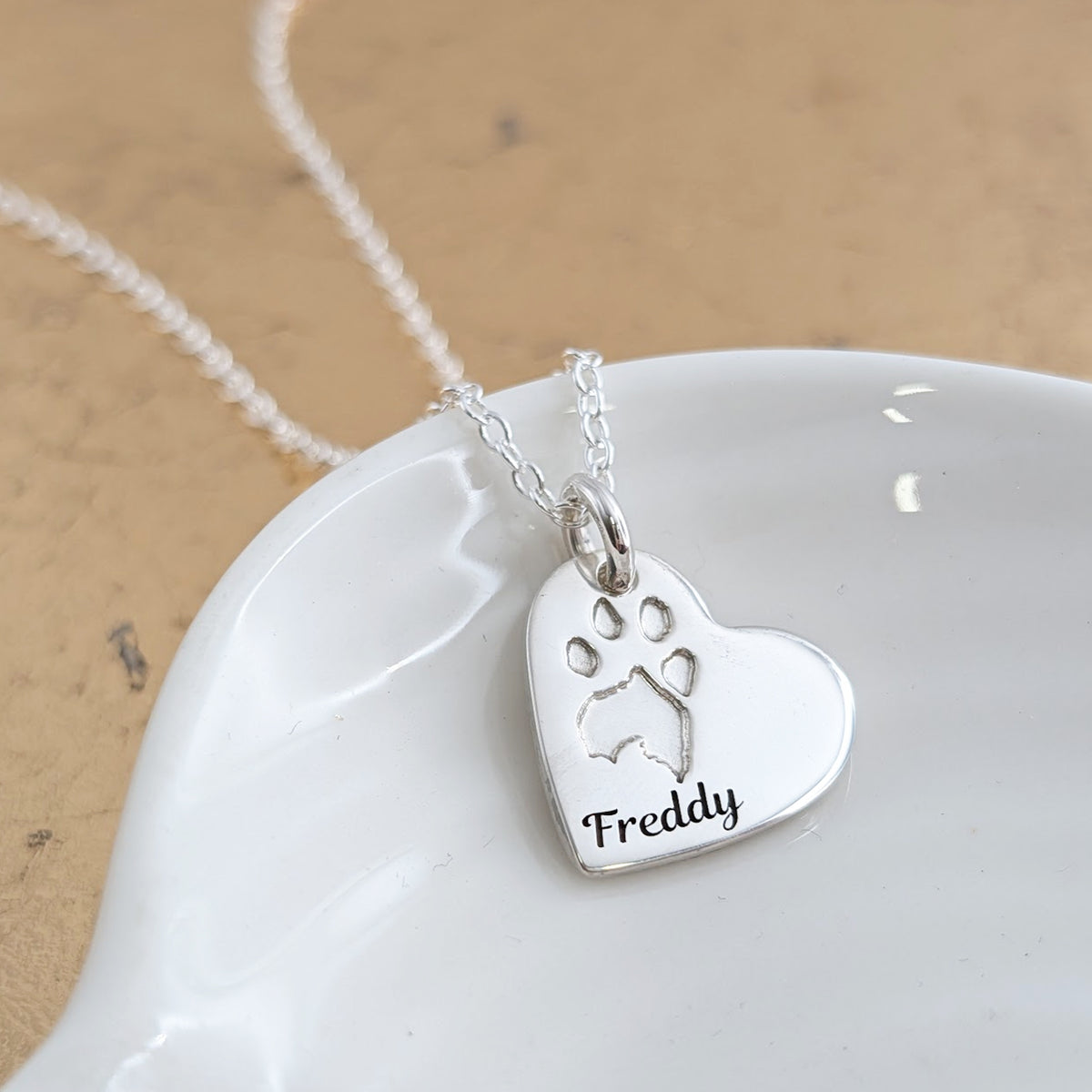 Pet's pawprint engraved silver heart necklace