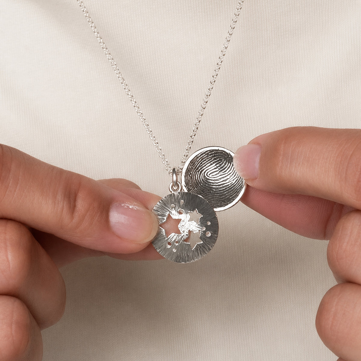 FINGERPRINT STARBURST LOCKET