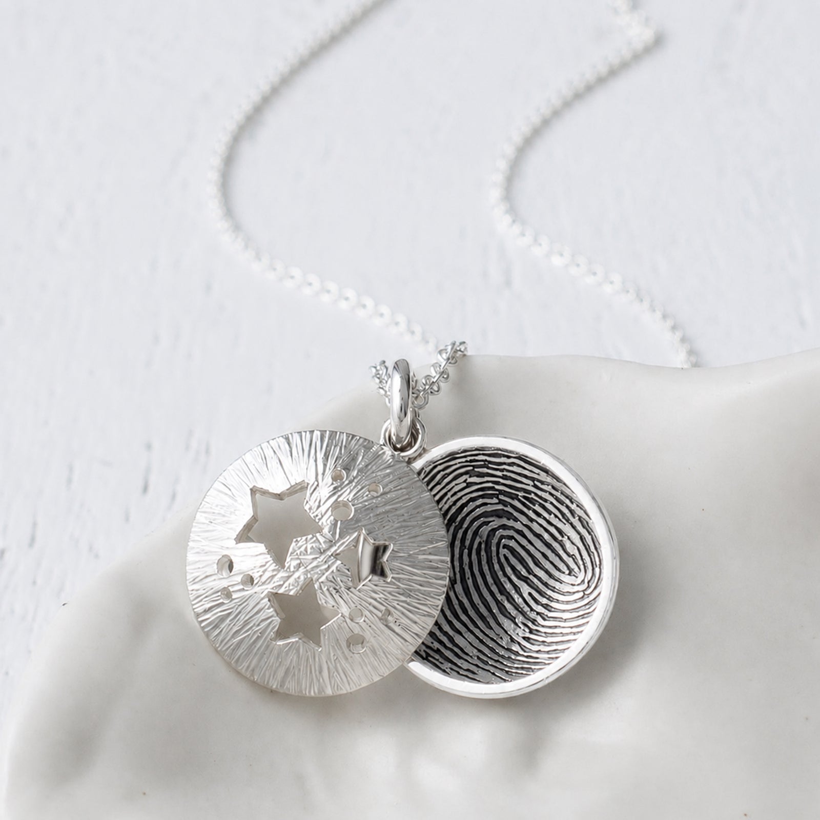 Starburst fingerprint locket handmade in sterling silver