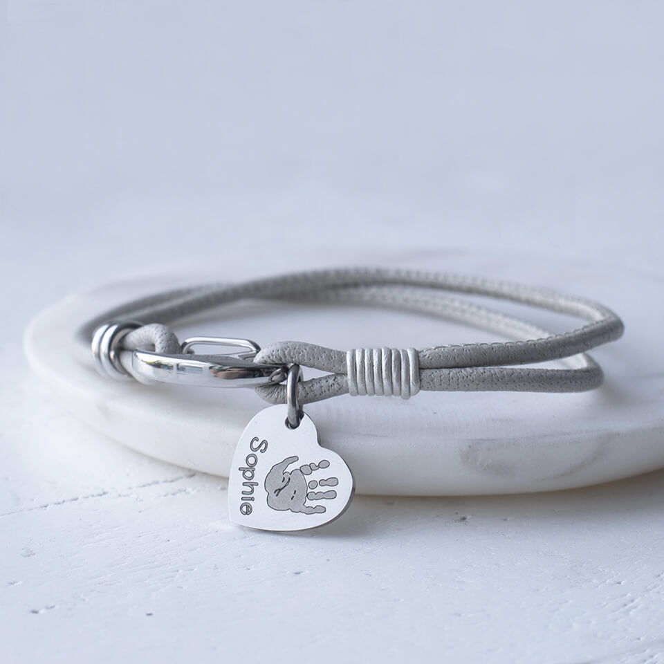Baby handprint and footprint heart charm on leather friendship bracelet | Grey
