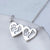 baby handprint and footprint double heart necklace in silver or gold