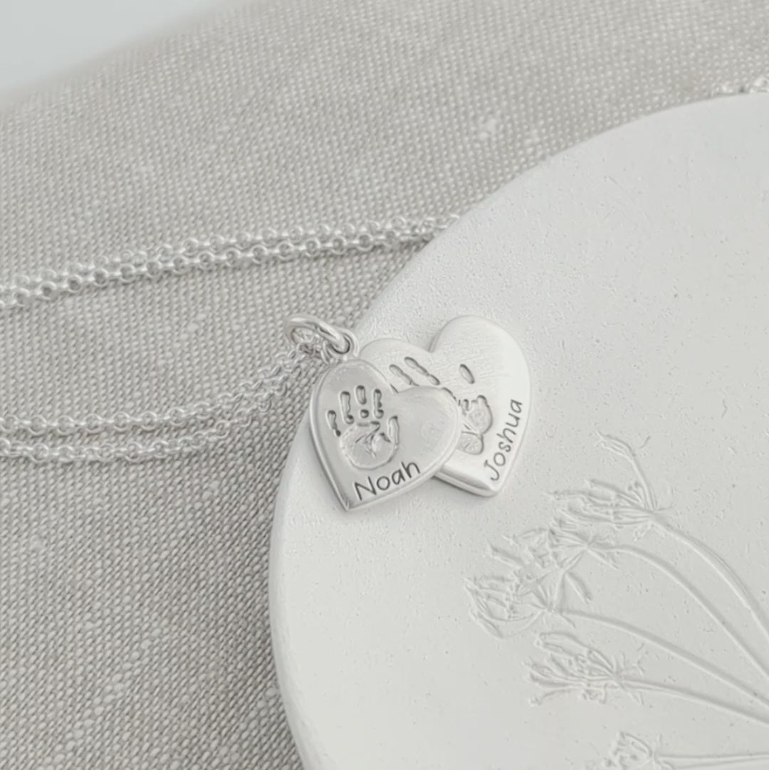 DOUBLE STACKED HEART HANDPRINT & FOOTPRINT NECKLACE