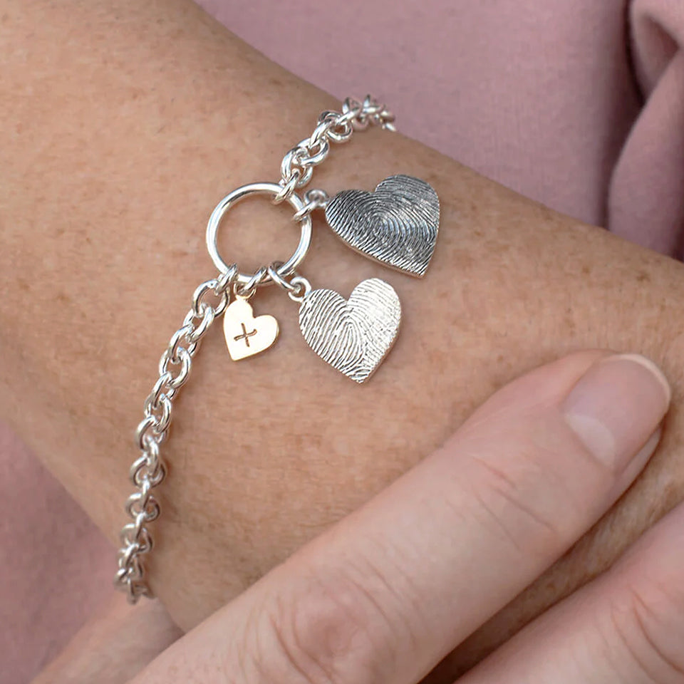 Fingerprint hugs and kisses charm bracelet in silver and gold