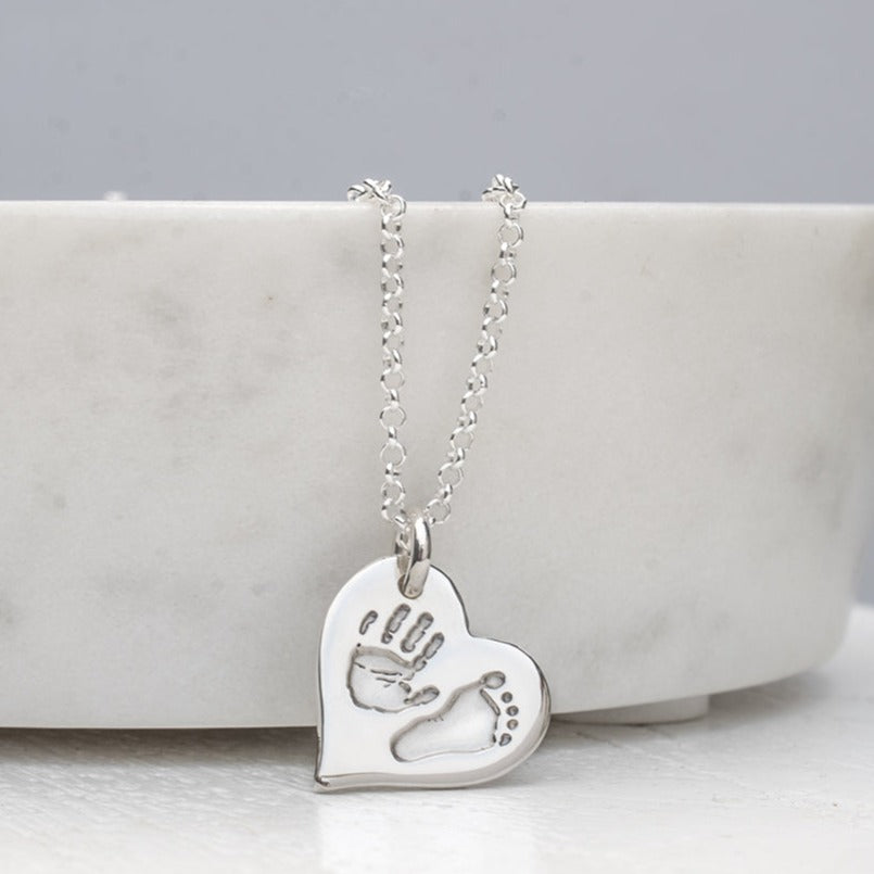 Handprint and footprint heart necklace