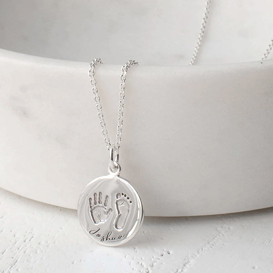 Baby handprint and footprint round charm with name