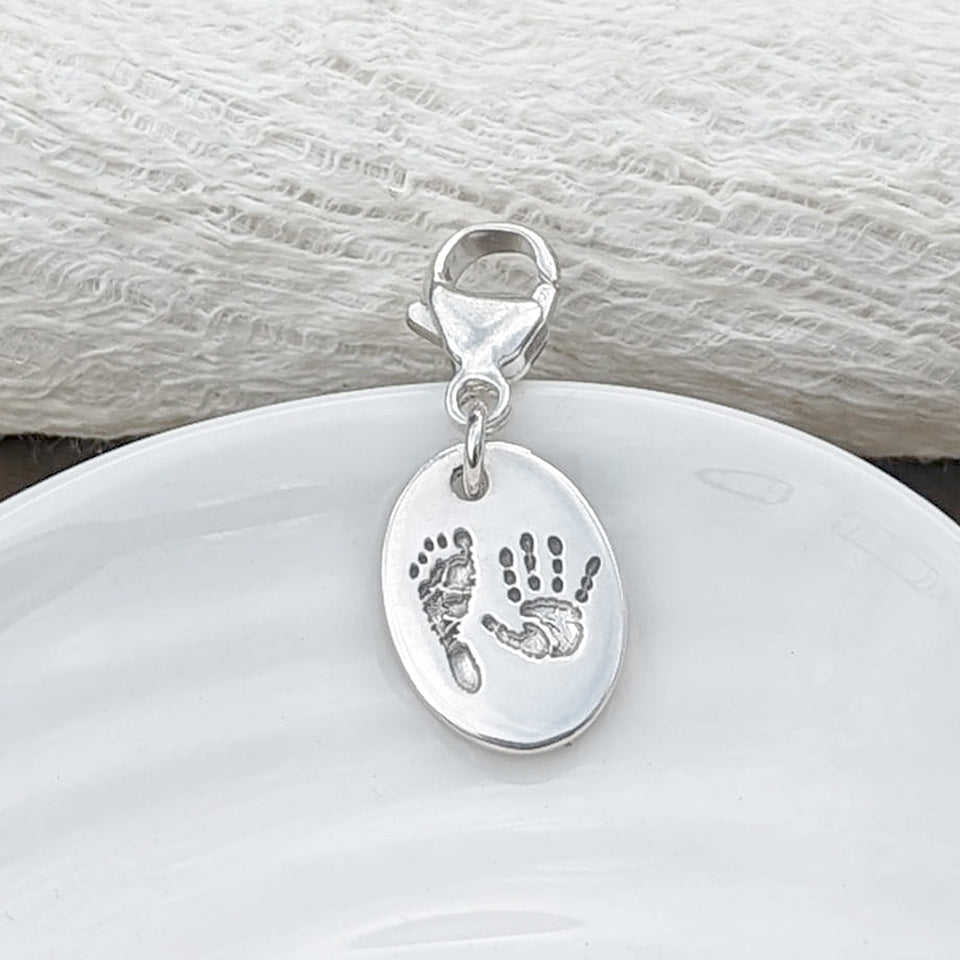 Child's Handprint and Footprint Oval Charm with clip to attach to bracelet