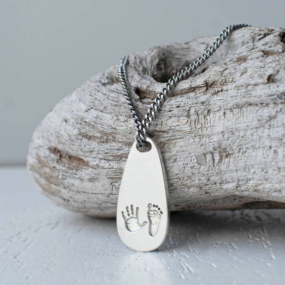 Baby handprint and footprint paddle necklace for men