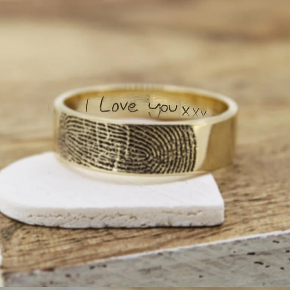 Mens wedding band with fingerprint clearance inside